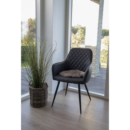 Scaun de dining, piele PU, negru, picioare negre, in living scandinav modern
