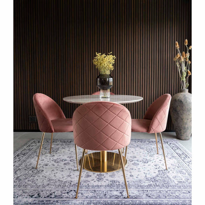 Masa de dining cu blat cu aspect de marmura, baza cu aspect alama, in living