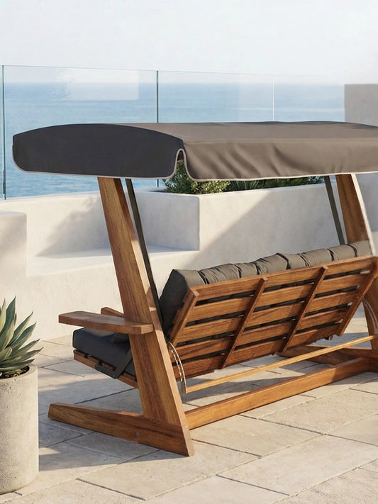 Leagăn de grădină Luna Premium din lemn, cu pernă și umbrelă gri antracit, pe terasă, vedere din spate
