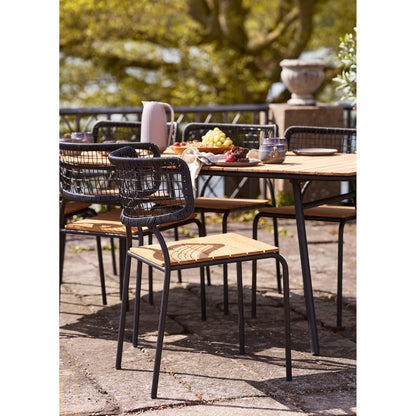 Scaun de dining, din tec/poliratan, negru/natur cu picioare negre, pe terasa