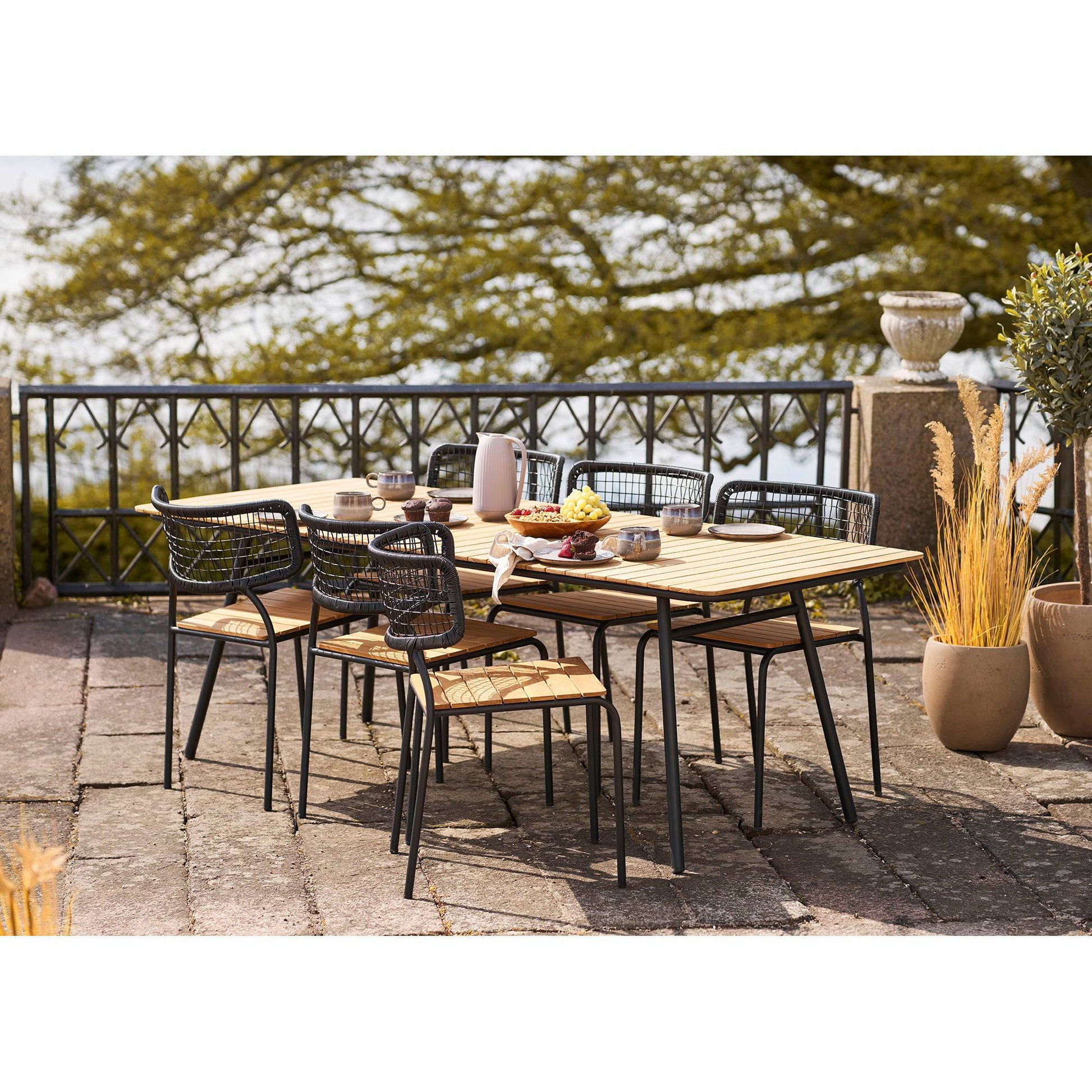 Scaun de dining, din tec/poliratan, negru/natur cu picioare negre, pe terasa