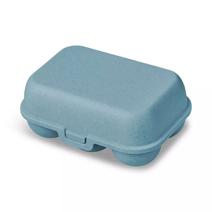 Cutie de transport pentru 6 oua Koziol Eggs to go albastra, pe fundal alb